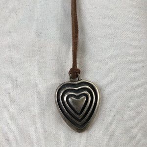 Cast base metal heart pendant